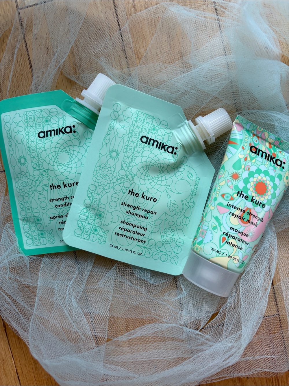 amika The Kure Strength Repair Shampoo, Conditioner & Mask three items